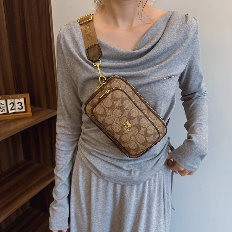 Original Circular-Pattern Logo Crossbody: Retro-luxury, durable fabric, adjustable strap. Ideal for daily/work/social use