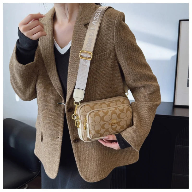 Original Circular-Pattern Logo Crossbody: Retro-luxury, durable fabric, adjustable strap. Ideal for daily/work/social use