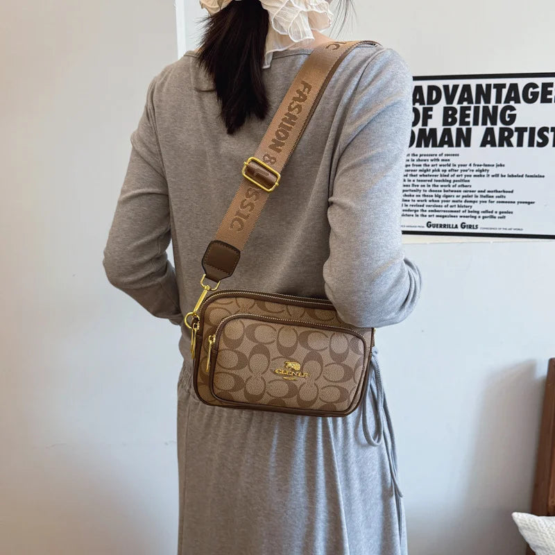 Original Circular-Pattern Logo Crossbody: Retro-luxury, durable fabric, adjustable strap. Ideal for daily/work/social use