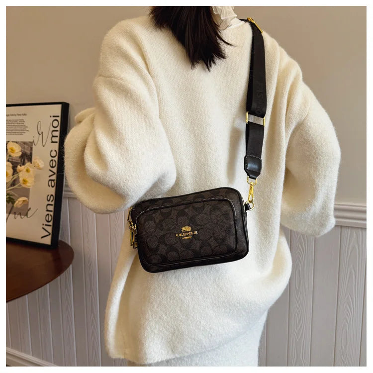 Original Circular-Pattern Logo Crossbody: Retro-luxury, durable fabric, adjustable strap. Ideal for daily/work/social use