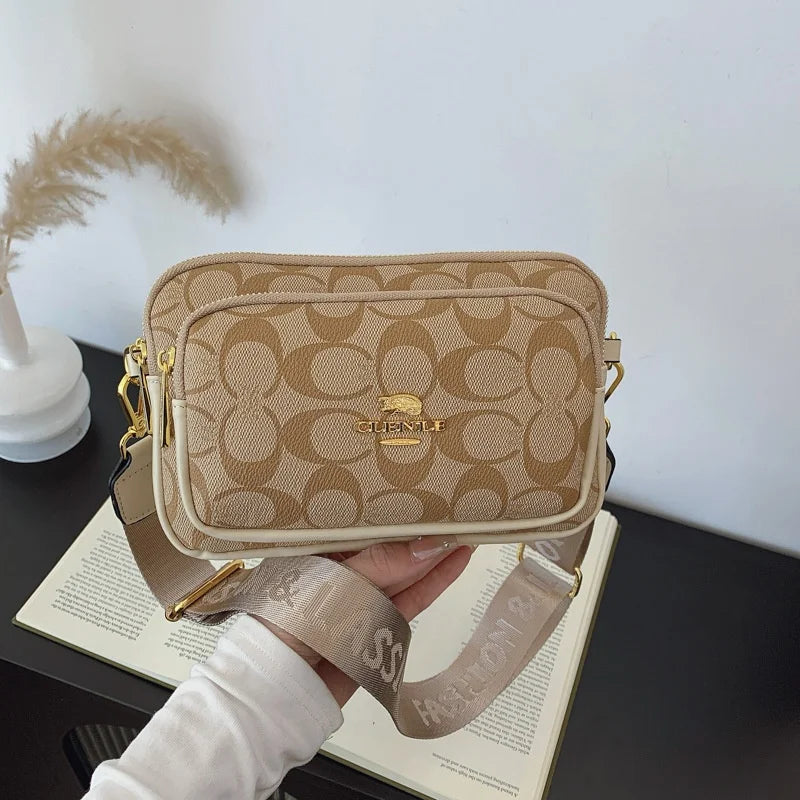 Original Circular-Pattern Logo Crossbody: Retro-luxury, durable fabric, adjustable strap. Ideal for daily/work/social use