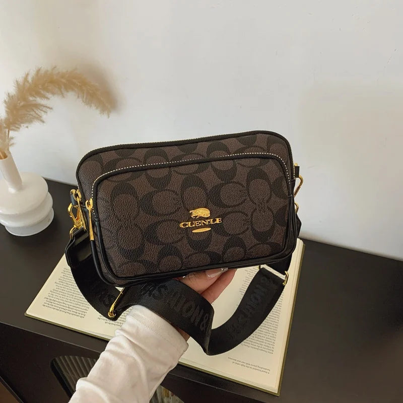 Original Circular-Pattern Logo Crossbody: Retro-luxury, durable fabric, adjustable strap. Ideal for daily/work/social use