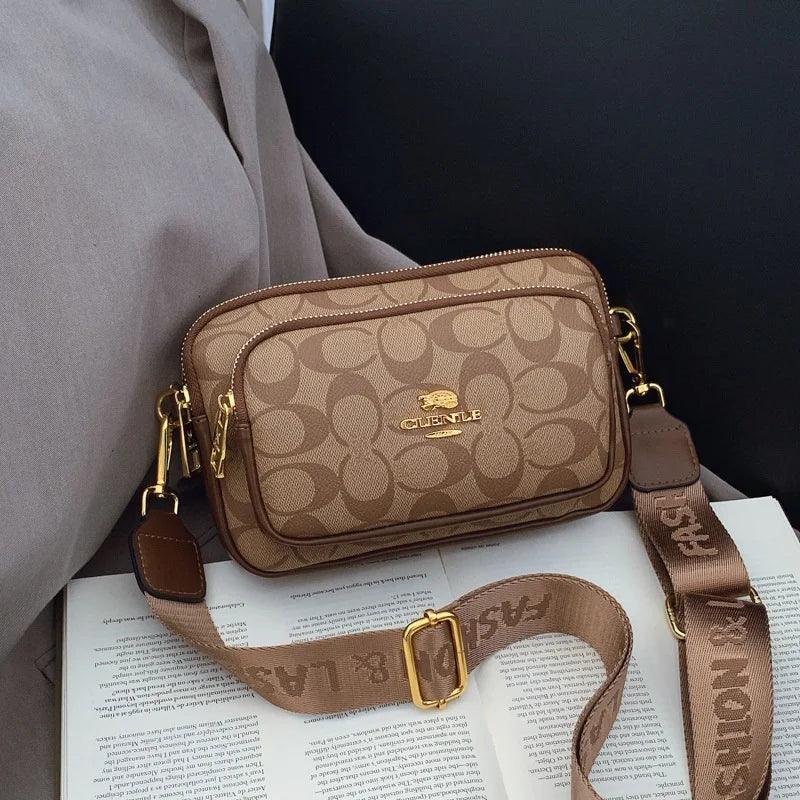 Original Circular-Pattern Logo Crossbody: Retro-luxury, durable fabric, adjustable strap. Ideal for daily/work/social use