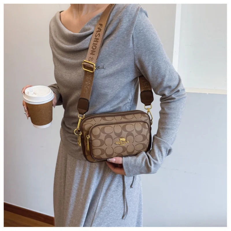 Original Circular-Pattern Logo Crossbody: Retro-luxury, durable fabric, adjustable strap. Ideal for daily/work/social use